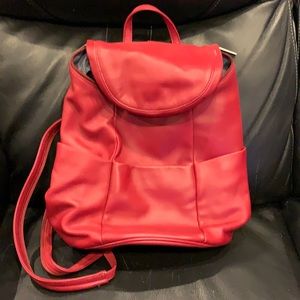 Norm Thompson Red leather backpack purse.